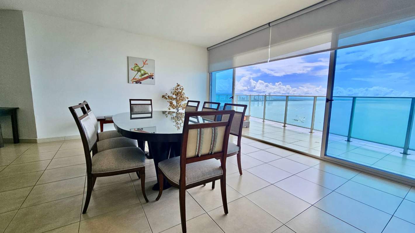 Dining area with balcony and ocean views furnished apartment Punta Pacifica Panama