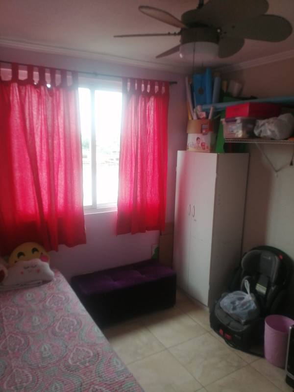 Bright secondary bedroom with closet AC unit ceiling fan in PH Girasoles Parque Lefevre