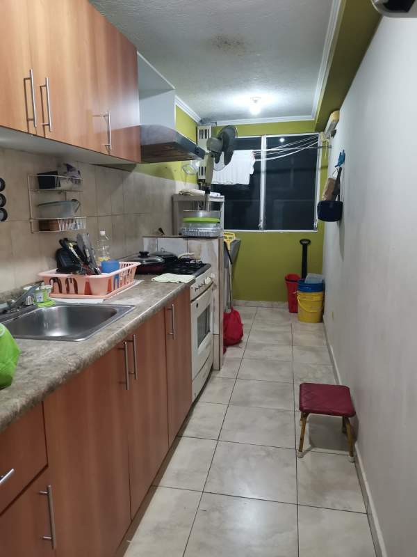 Contemporary bathroom with tiled walls pedestal sink and shower in Parque Lefevre apartment