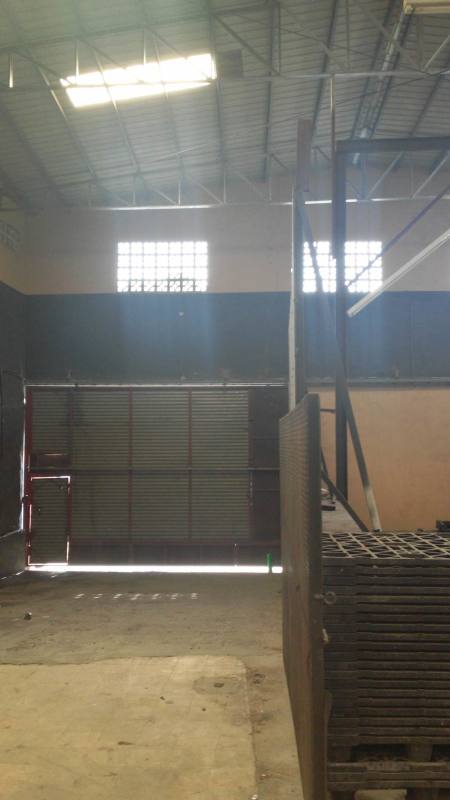 Warehouse bathroom with pedestal sink and toilet Pueblo Nuevo Panama