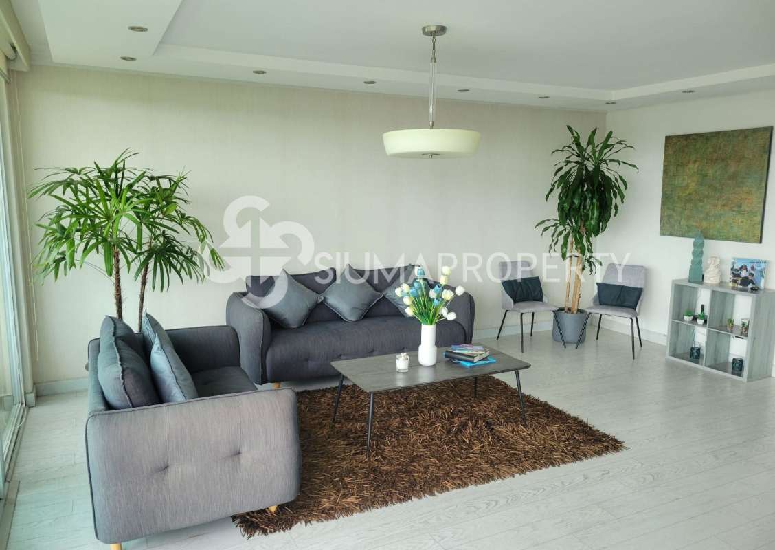 Open plan living dining room with natural light, tile floors, balcony access in PH Pine Hills Albrook Panama