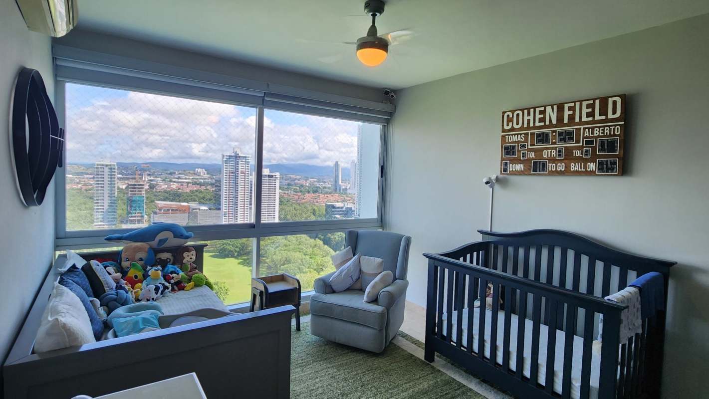 Master bedroom with large windows, ocean view, walk-in closet in Costa del Este PH Titanium Panama