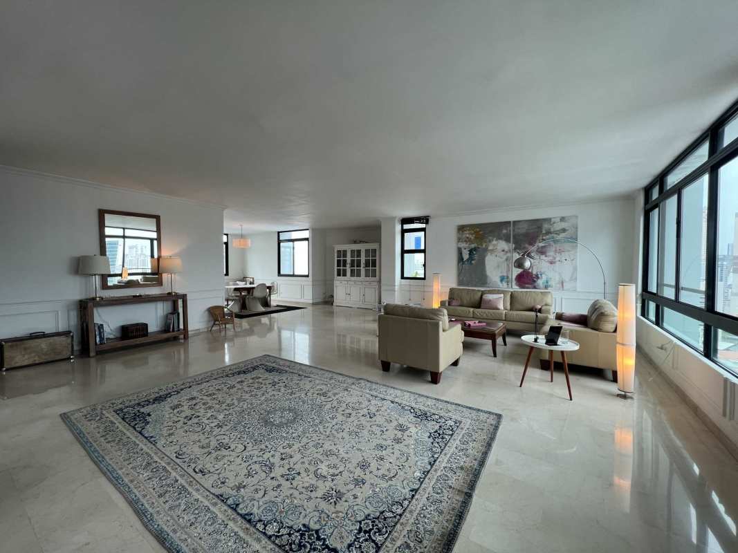 Large master bedroom with panoramic ocean view windows at PH Brisas de Marbella Panama City