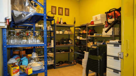 Cozy bedroom with colorful walls and rustic furnishings in Playa Coronado beach villa