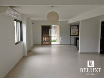 Large open plan living and dining room with porcelain floors in Woodlands Panama Pacifico