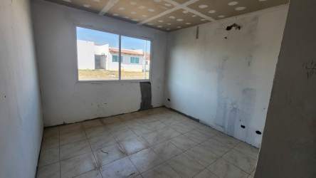 Large covered terrace patio with tiled flooring overlooking garden in Nueva Gorgona Panama