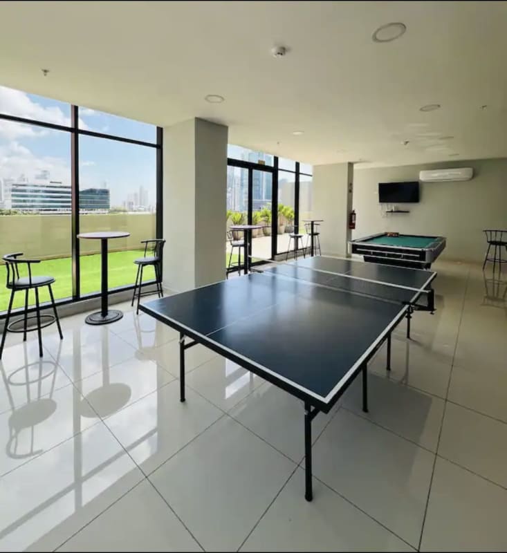 Open living dining area with city view balcony PH Downtown Obarrio
