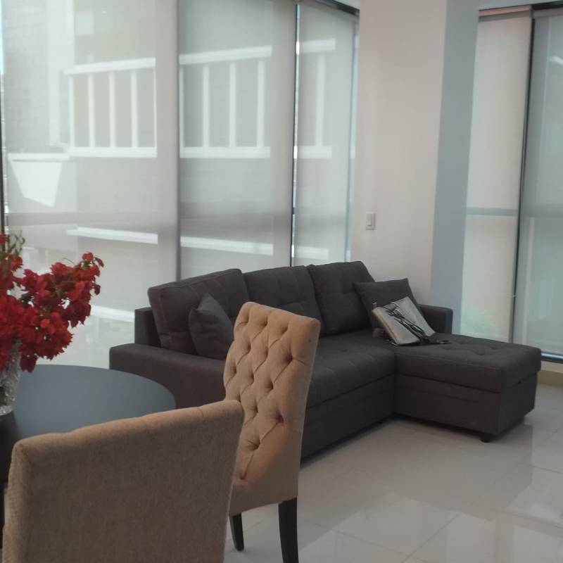 Skyscraper with gold reflective facade PH Downtown Obarrio Panama