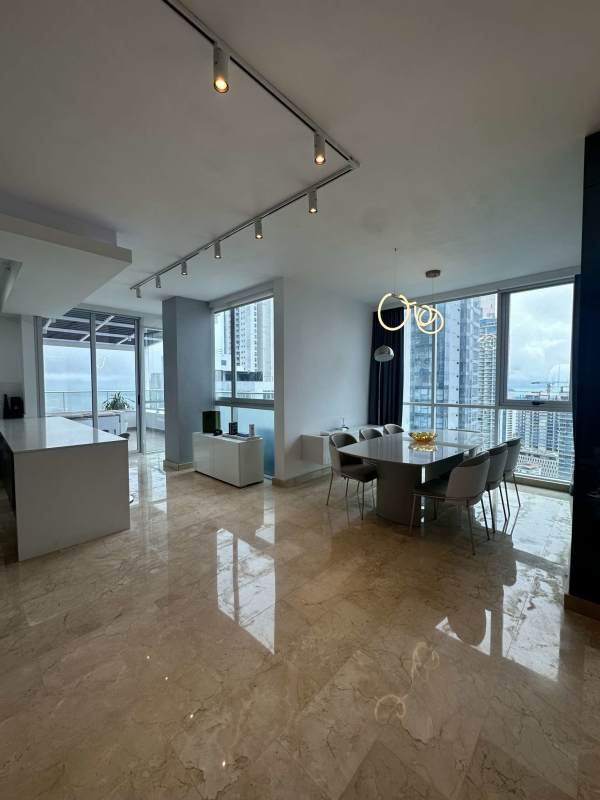 Contemporary open kitchen with breakfast bar and high-end appliances PH Dynasty Penthouse Panama