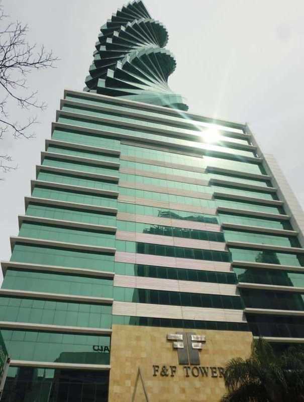 Elegant bathroom with vessel sink mirror and white finishes Revolution Tower Panama City