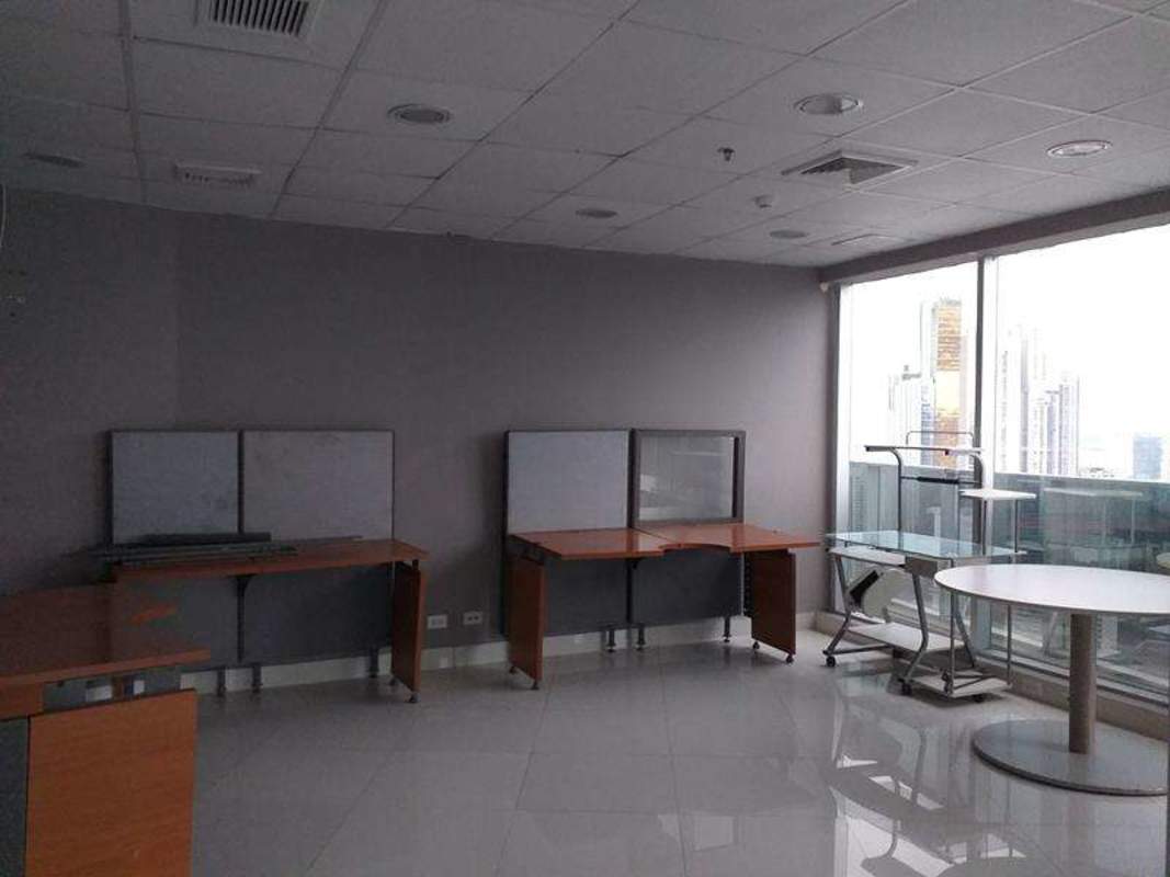 Corner office with panoramic windows and city skyline views F&F Tower Panama