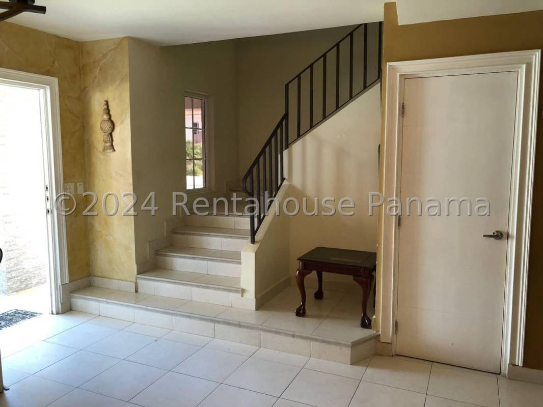 Bright entryway with staircase ceramic floors Mediterranean house Quintas de Versalles Panama City