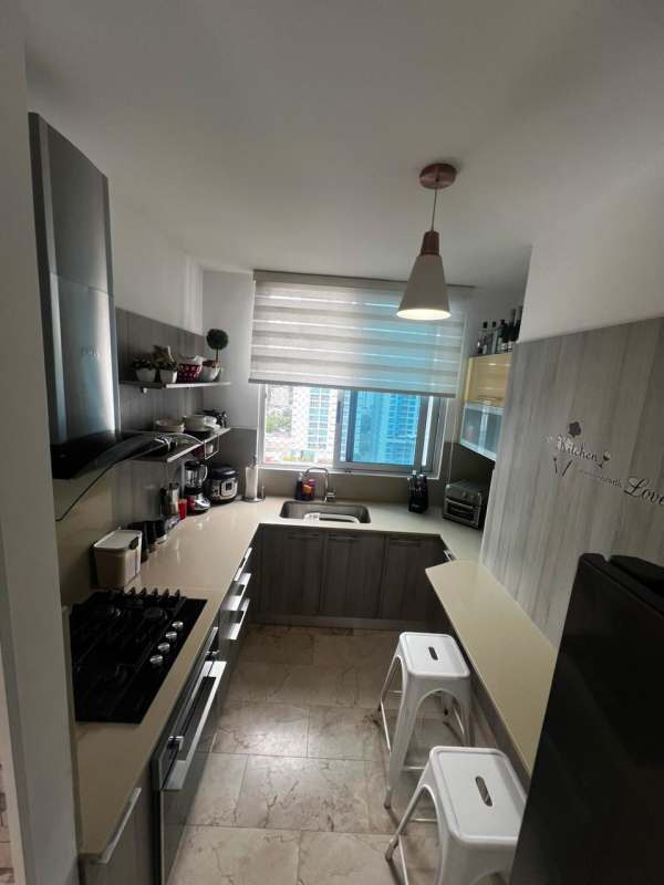 Contemporary kitchen with granite countertops and modern appliances in PH BICSA