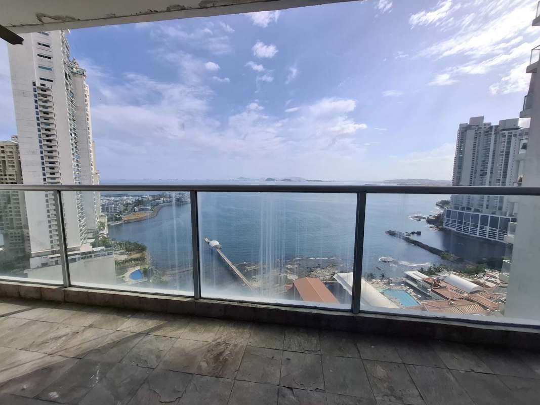 Expansive balcony with glass railing and sea views Punta Pacifica luxury condo