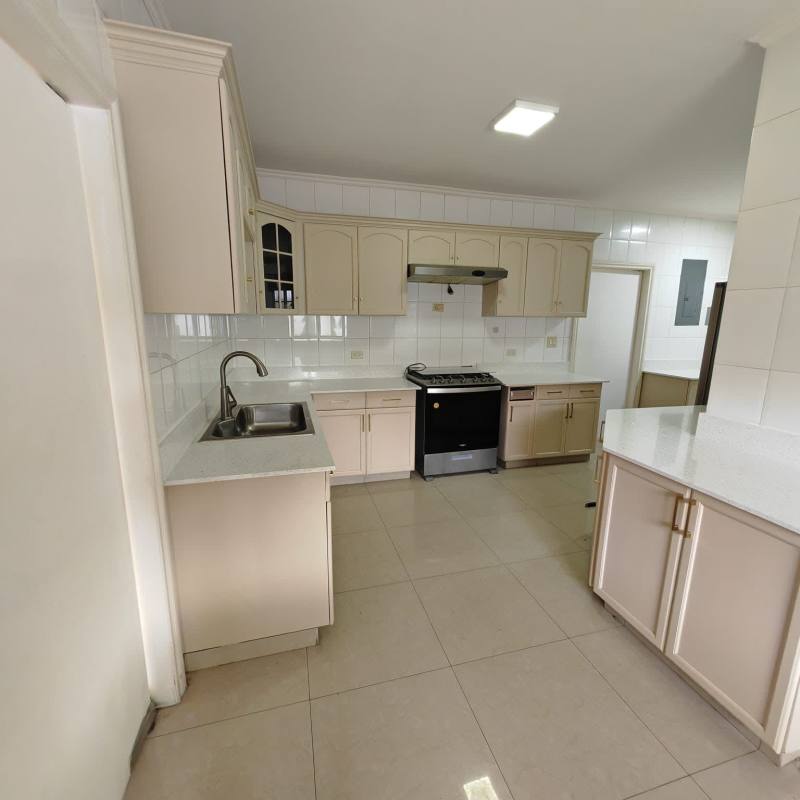 Spacious traditional kitchen with island counter, oven, cabinets Costa del Este Panama