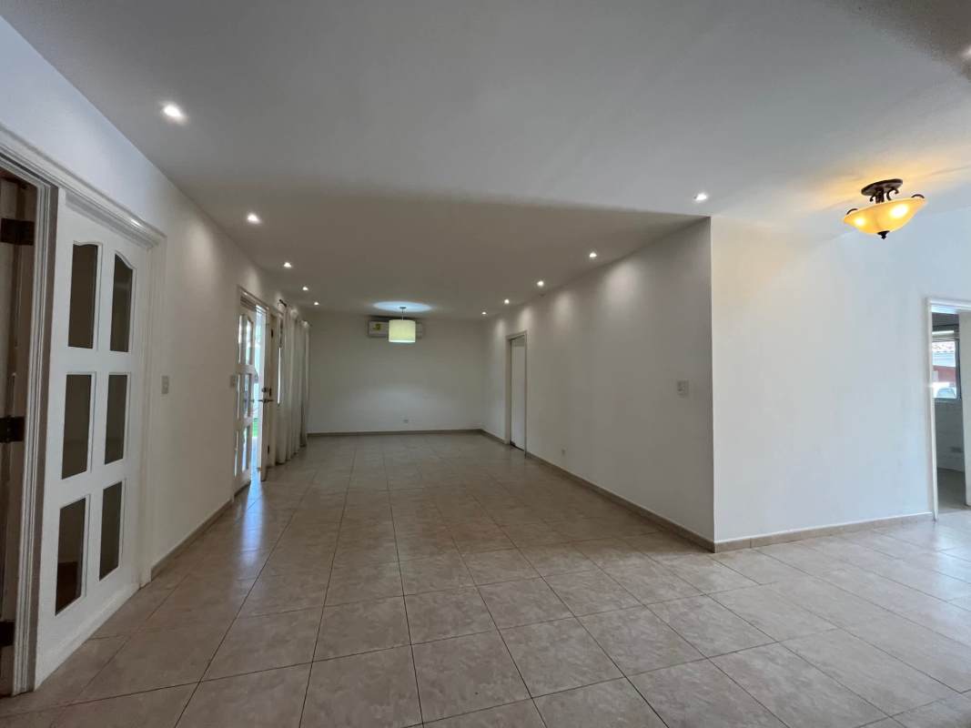 Empty simple bedroom with ceramic tile, fan, split AC in PH Palmeras del Este Costa del Este Panama