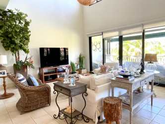 Modern airy living space with large windows in duplex condo Buenaventura Panama