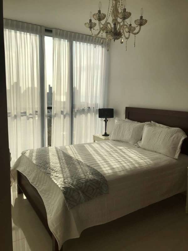 Elegant master bedroom with large window, AC, closet at PH Quartier Quartz Obarrio Panama