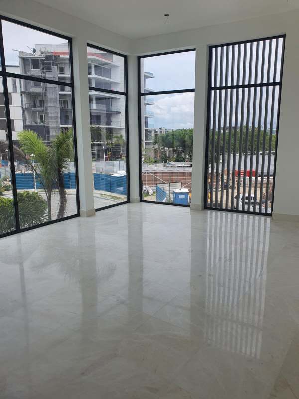 Spacious master bedroom with private ocean view terrace at City Villa in Ocean Reef Panama City