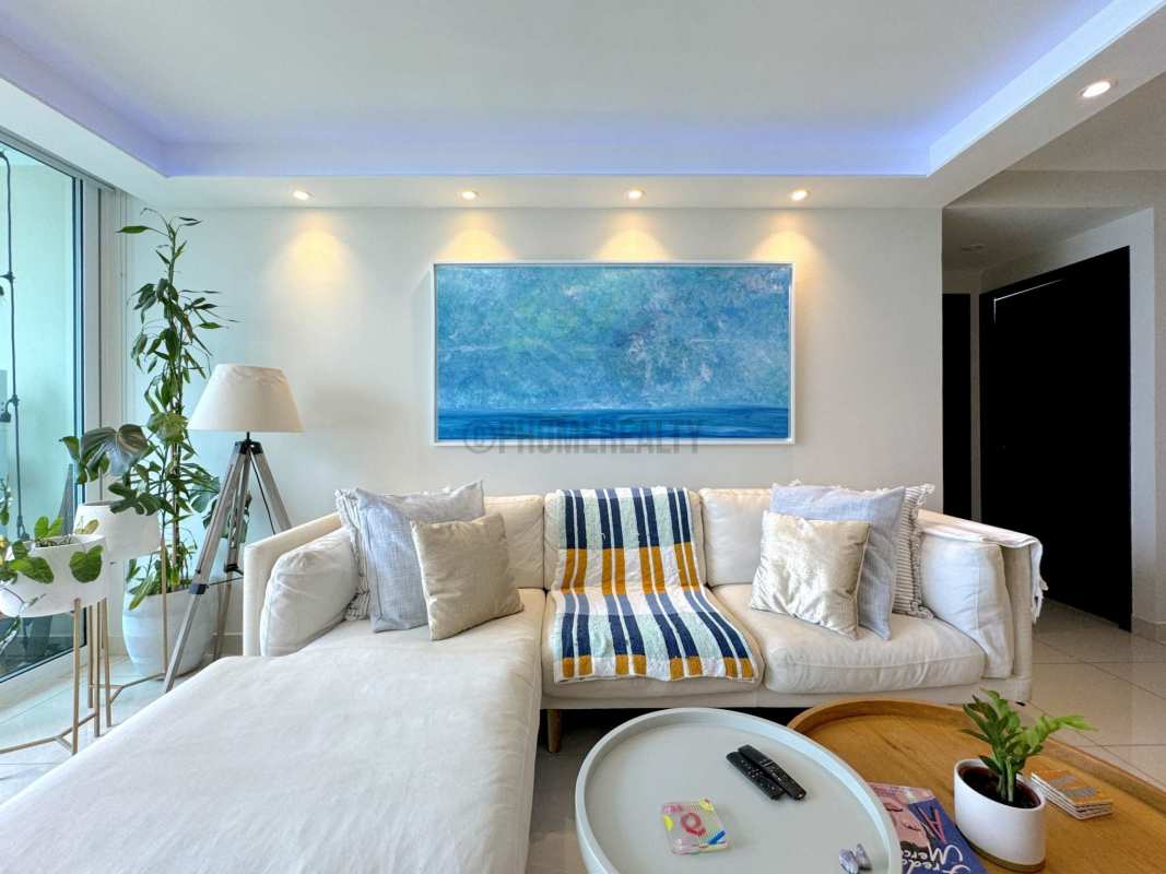 Modern bathroom with glass enclosed shower in Panama City apartment for sale