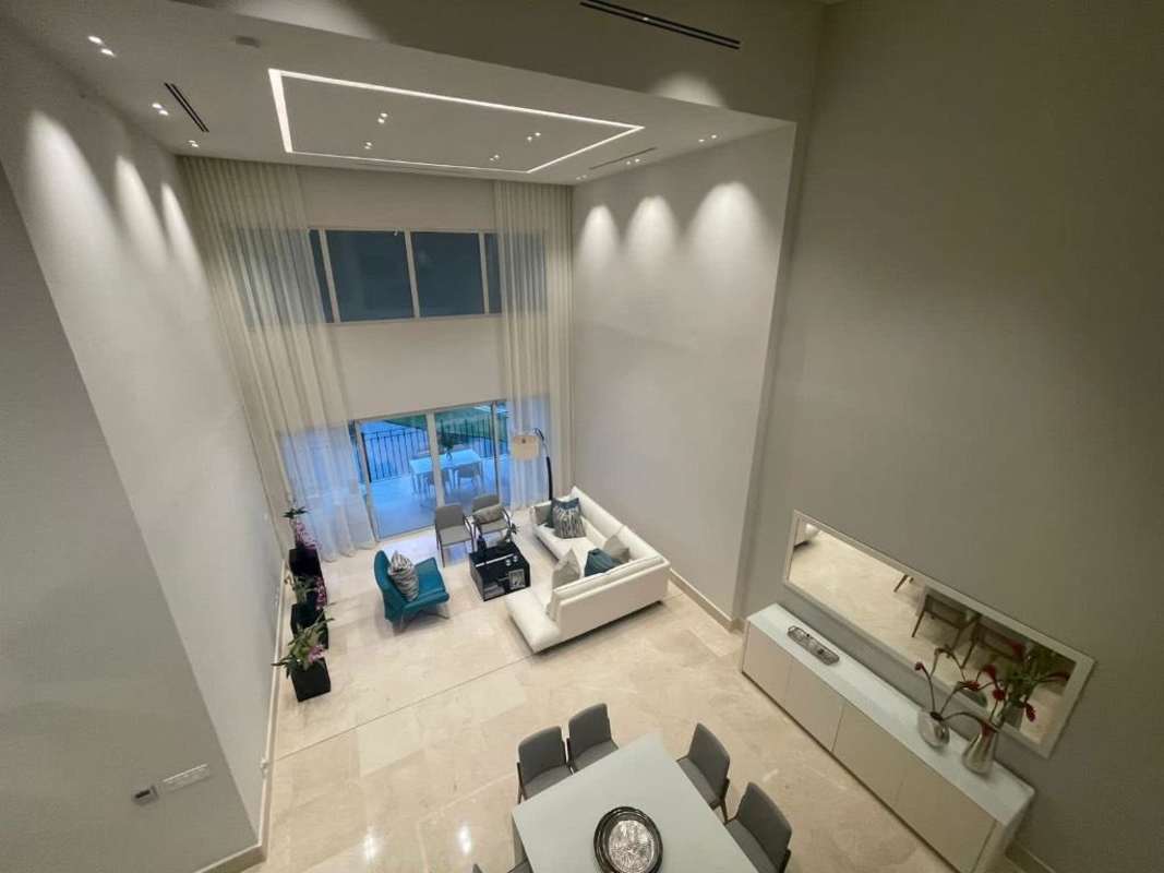 Designer kitchen with large island, premium appliances and marble finishes overlooking golf course at The Reserve Panama