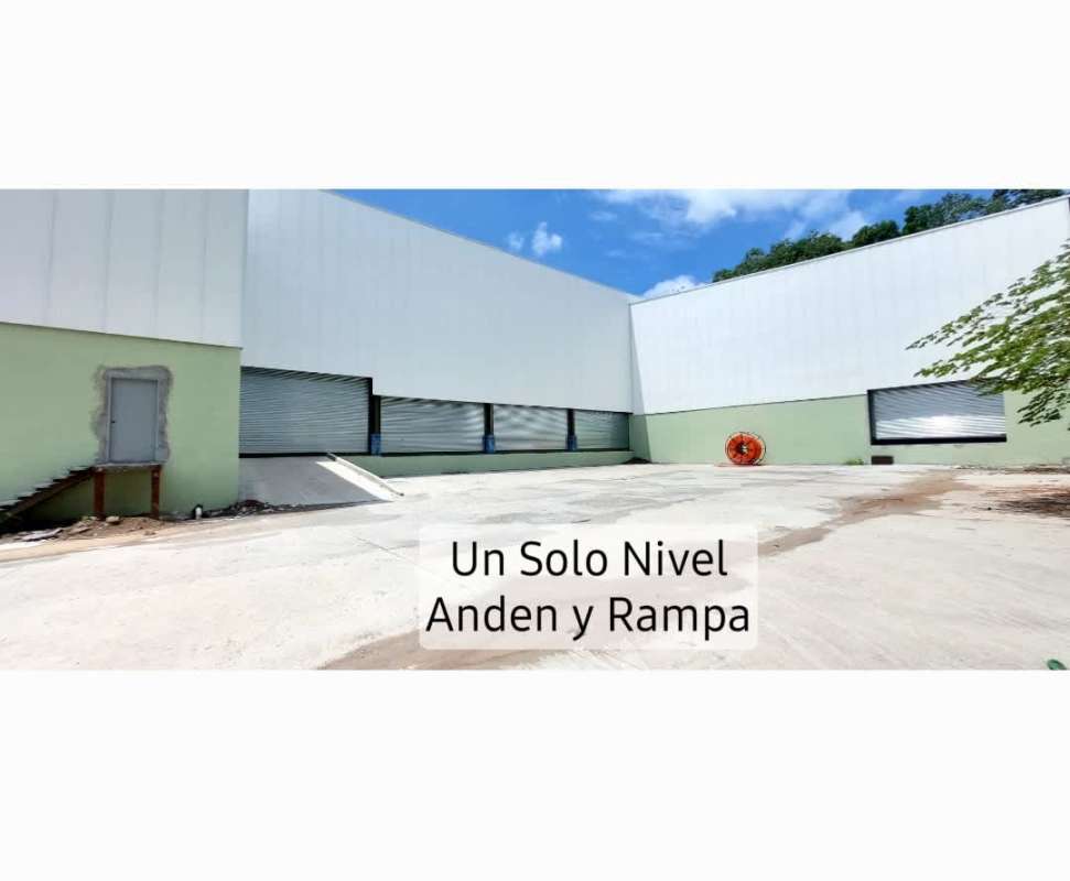 Industrial warehouse with multiple loading ramps, roll-up doors, access for container trucks at Mega Galeras Las Mañanitas Panama