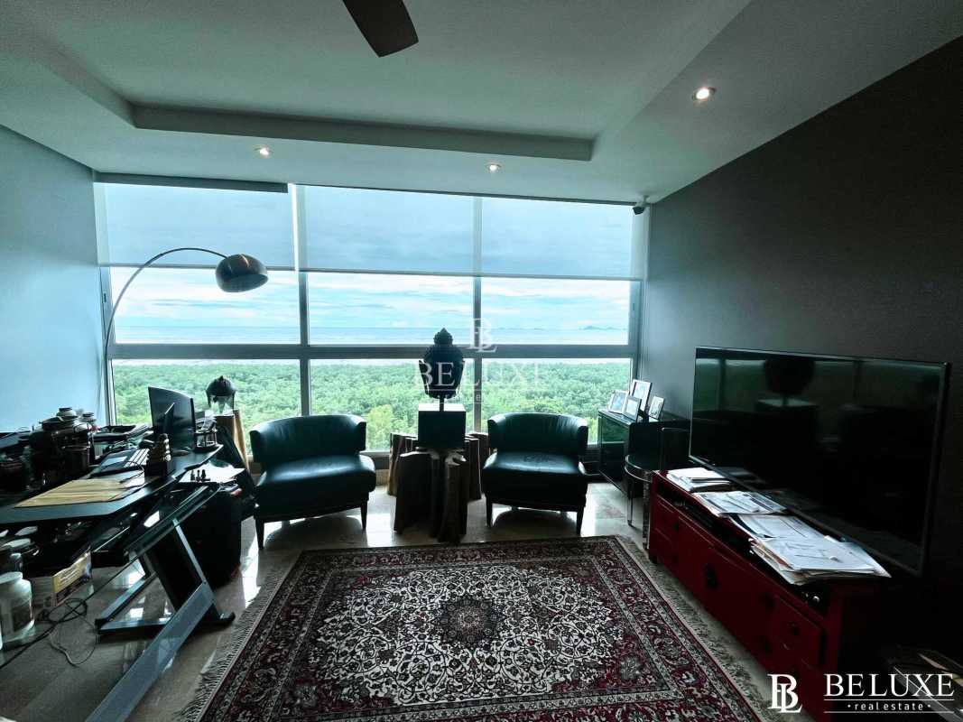 Master bedroom with floor to ceiling oceanview windows in PH Acqua II Costa del Este Panama