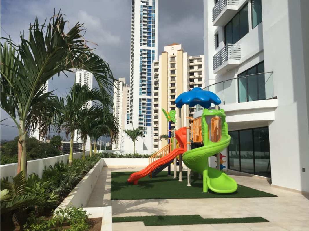 View of adult and children’s swimming pools with landscaped gardens in PH Forest Gate Clayton Panama
