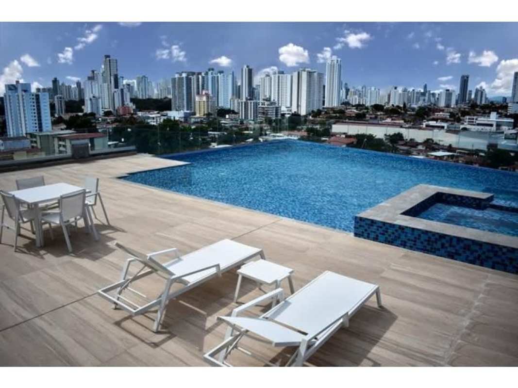Rooftop infinity pool and jacuzzi overlooking Panama City skyline PH Miradores Residences