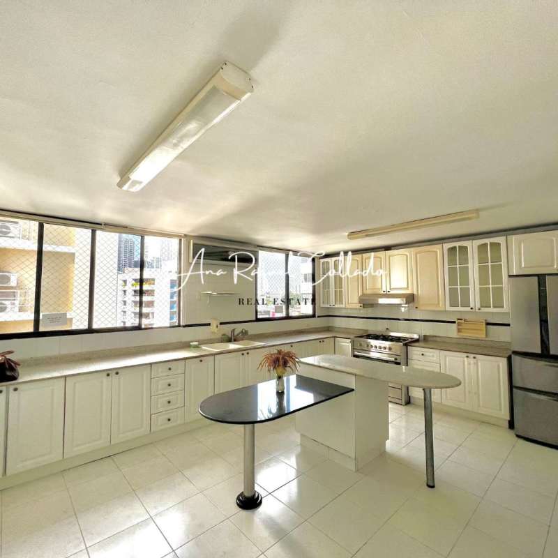 Kitchen with island, granite counters, large windows PH Marina del Mar Panama City