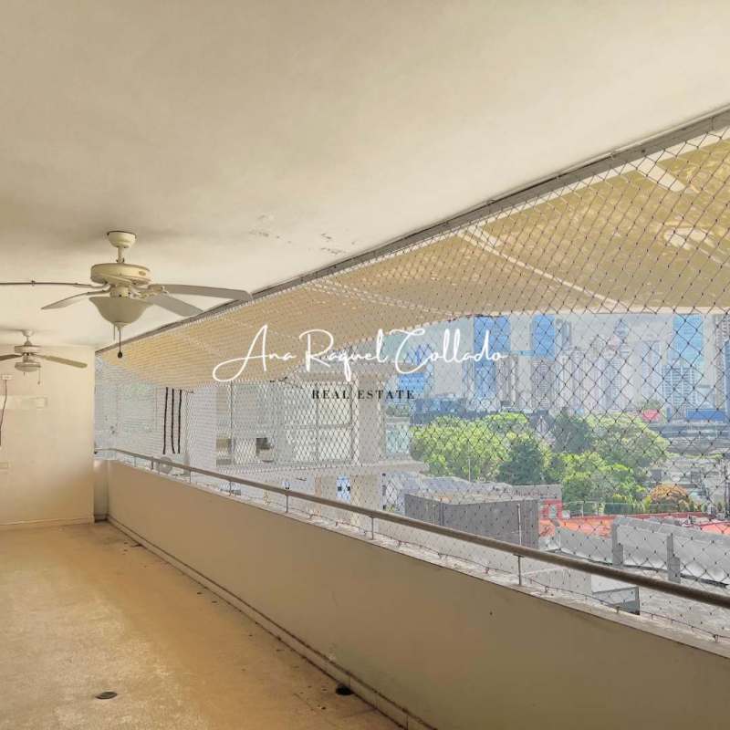 Covered balcony with ceiling fans and safety mesh PH Marina del Mar Panama City