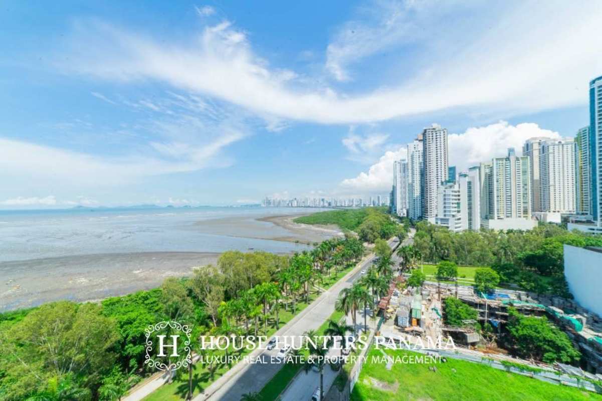 Elegant bathroom with glass shower, vanity, large windows in PH Ten Tower Costa del Este Panama
