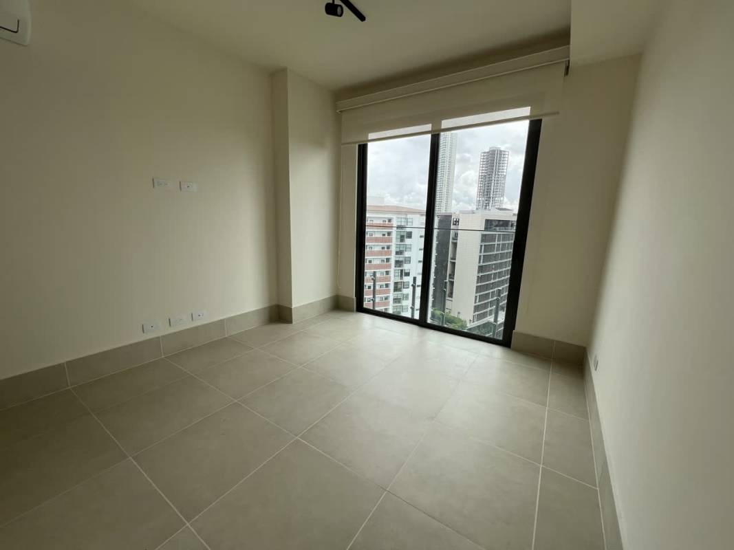 Contemporary open kitchen in Ocean House Santa Maria with light wood cabinetry and appliances