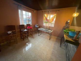 Rustic living area with wood ceiling, bright natural light and countryside views Santa María Divisa Herrera