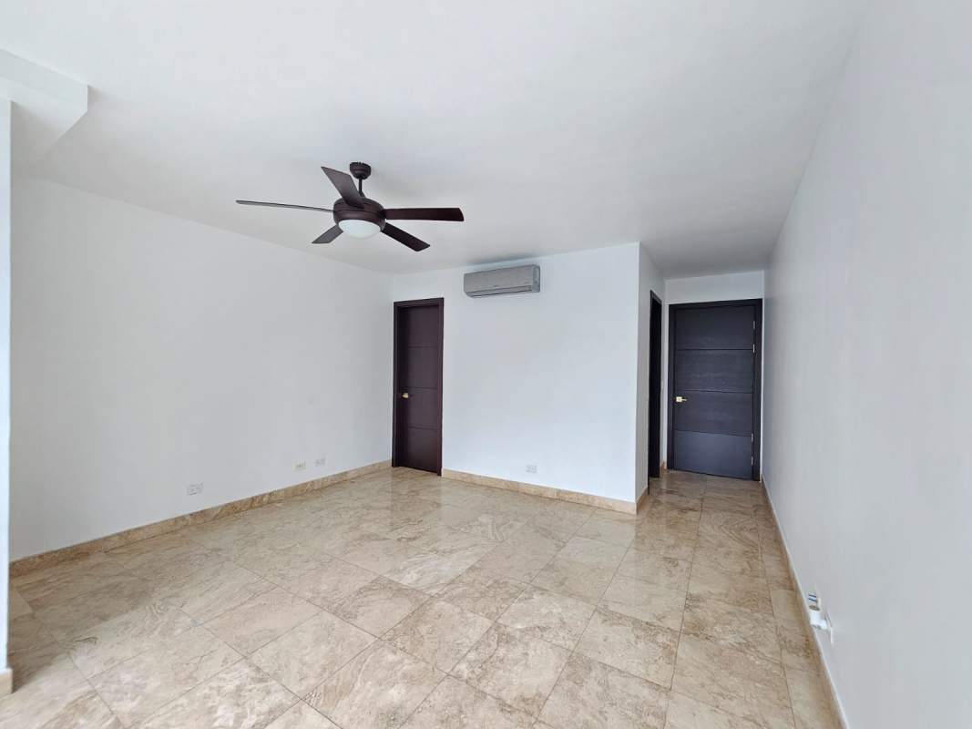 Luxury infinity pool with lounge deck and panoramic skyline views at PH Titanium Costa del Este Panama City