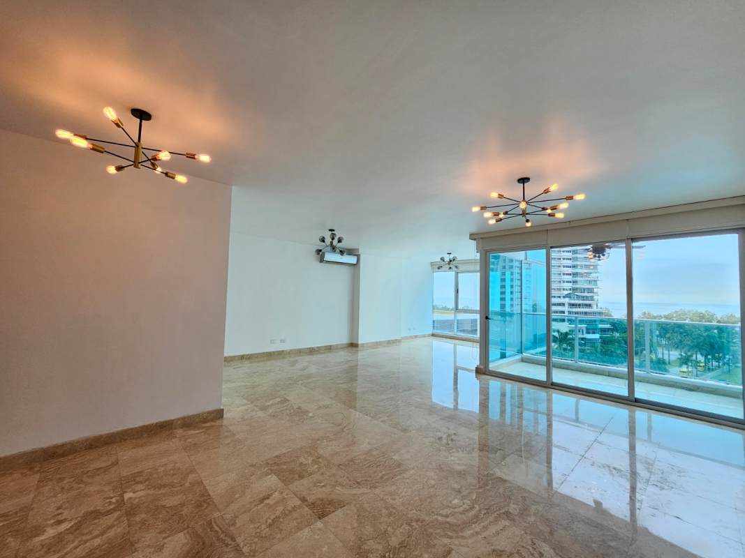 Elegant bedroom with marble floors and panoramic ocean views at PH Titanium Costa del Este