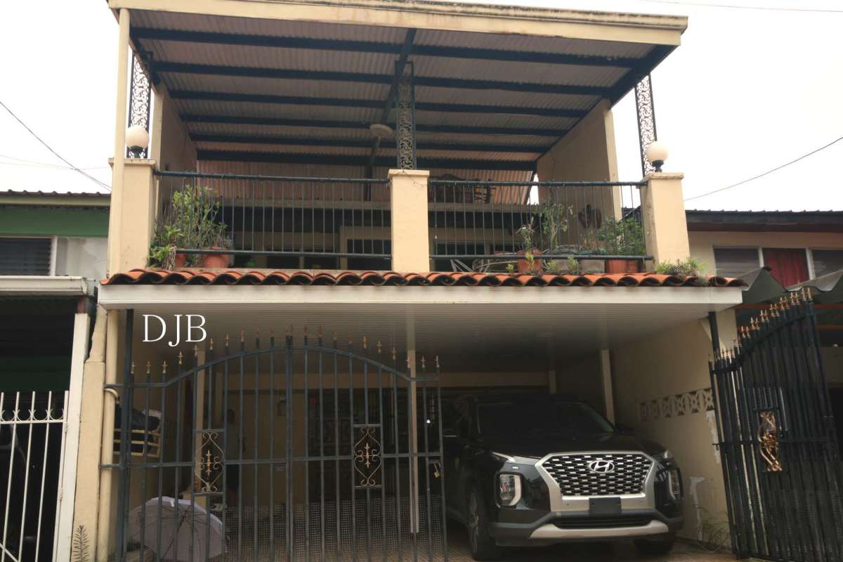 Covered balcony terrace with tiled floor in duplex house Betania Panama City
