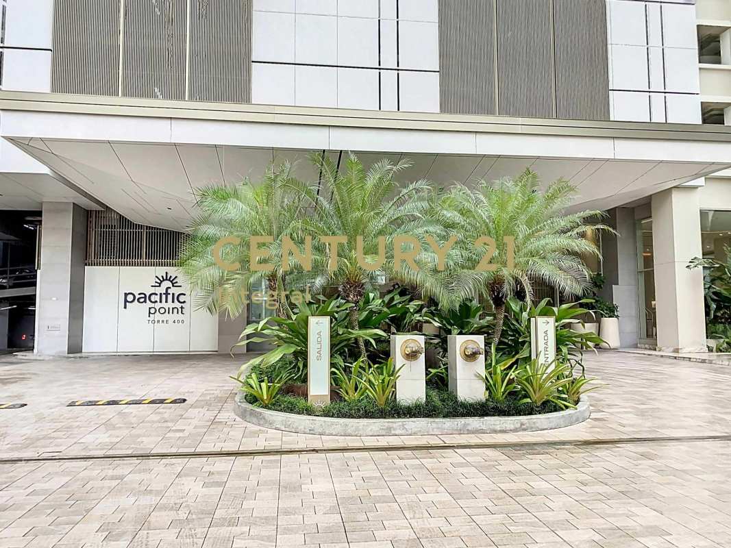 Contemporary kitchen with island, luxury appliances, floor-to-ceiling city views in Pacific Point Punta Pacifica Panama