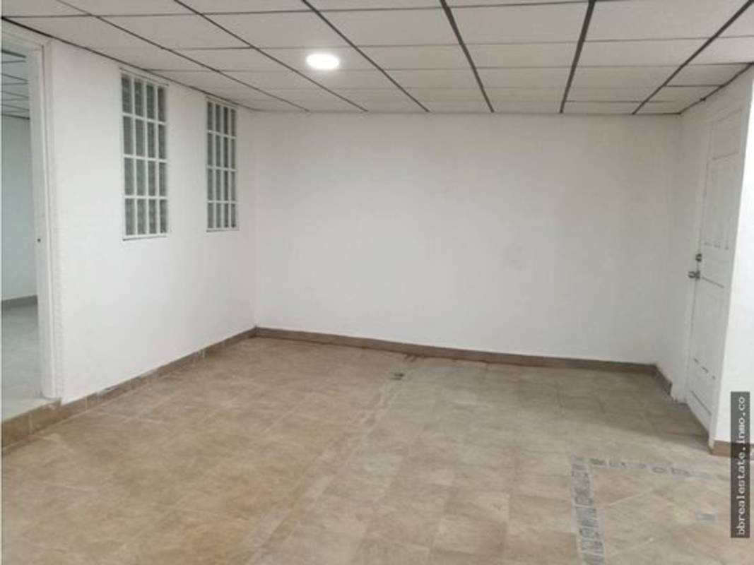 Dining room with tile floor near kitchen area La Fontana Chanis Panama