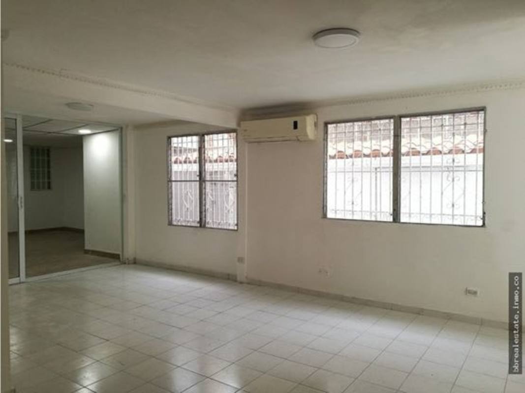 Spacious living room with tiled floor and natural light in La Fontana Chanis