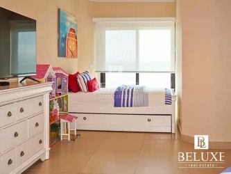 Luxury bright bedroom with ensuite bath and ocean views in Vista Mar Beach Golf Marina condo Panama
