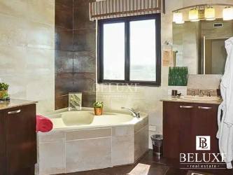 Spacious master bedroom suite with private balcony and ocean views in Vista Mar Beach condo Panama