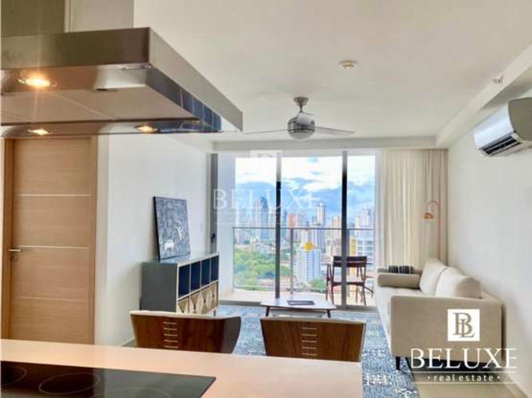 Master bedroom with mirrored closet, blackout, and city view in PH Torres de Castilla Panama City