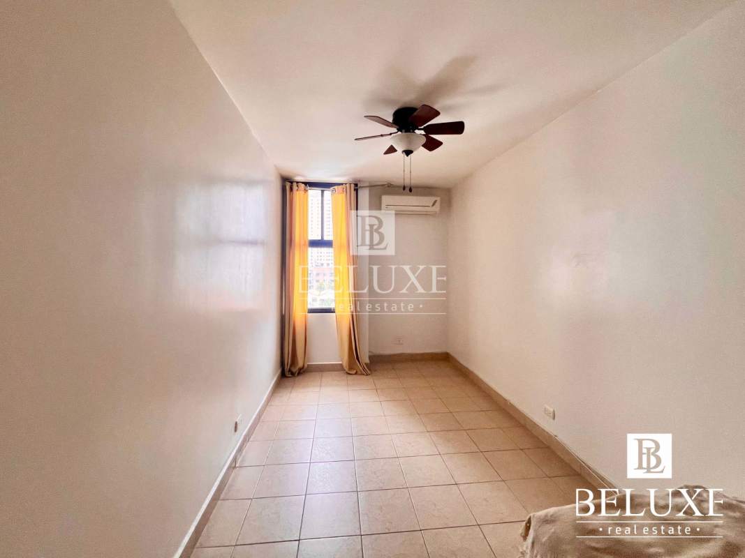 Unfurnished bedroom with tile floors, AC, fan, built-in closet PH Don Camilo