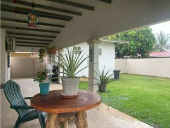 Furnished kitchen with granite countertop and appliances in El Mirador Coclé Panama house for sale