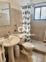 Bathroom featuring walk-in shower ceramic tile finishes duplex in Club Ecuestre Panama
