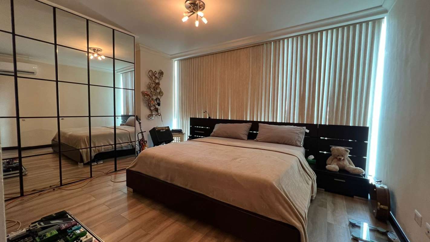 Colorful children's playground with slides and city views at PH Pacific Sun Punta Pacifica Panama