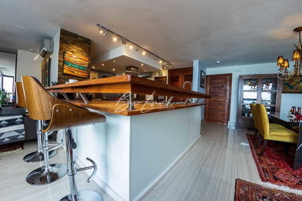 Bright open living and dining room with balcony access and stunning sea views PH Coral Reef Avenida Balboa Panama