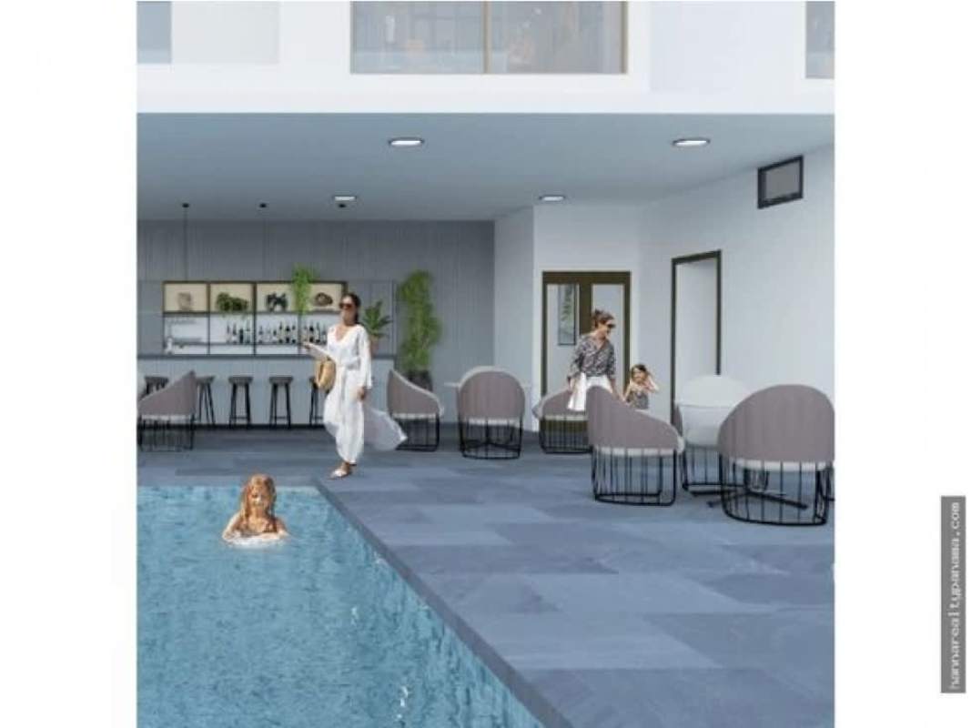 Modern kitchen with breakfast counter in PH Oasis Zen Rio Abajo