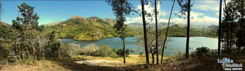 Vast natural lakefront setting bordered by forests and hills near Boquete Panama